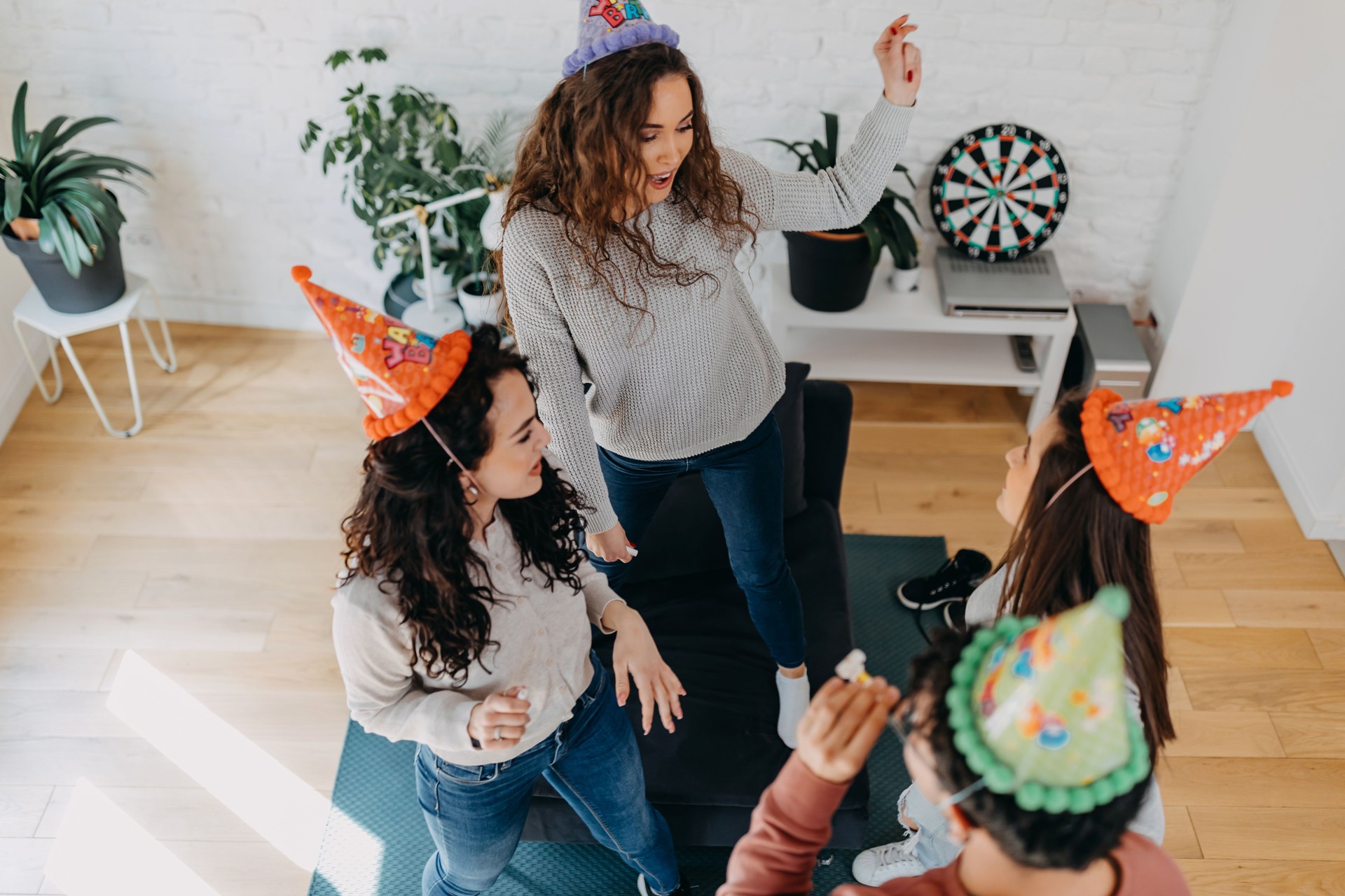 Young adults celebrating a birthday party